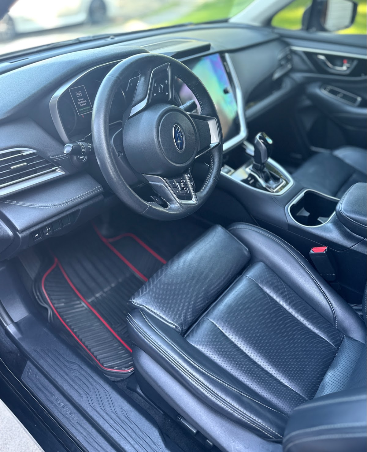 Spotless detailed Subaru interior with clean leather seats