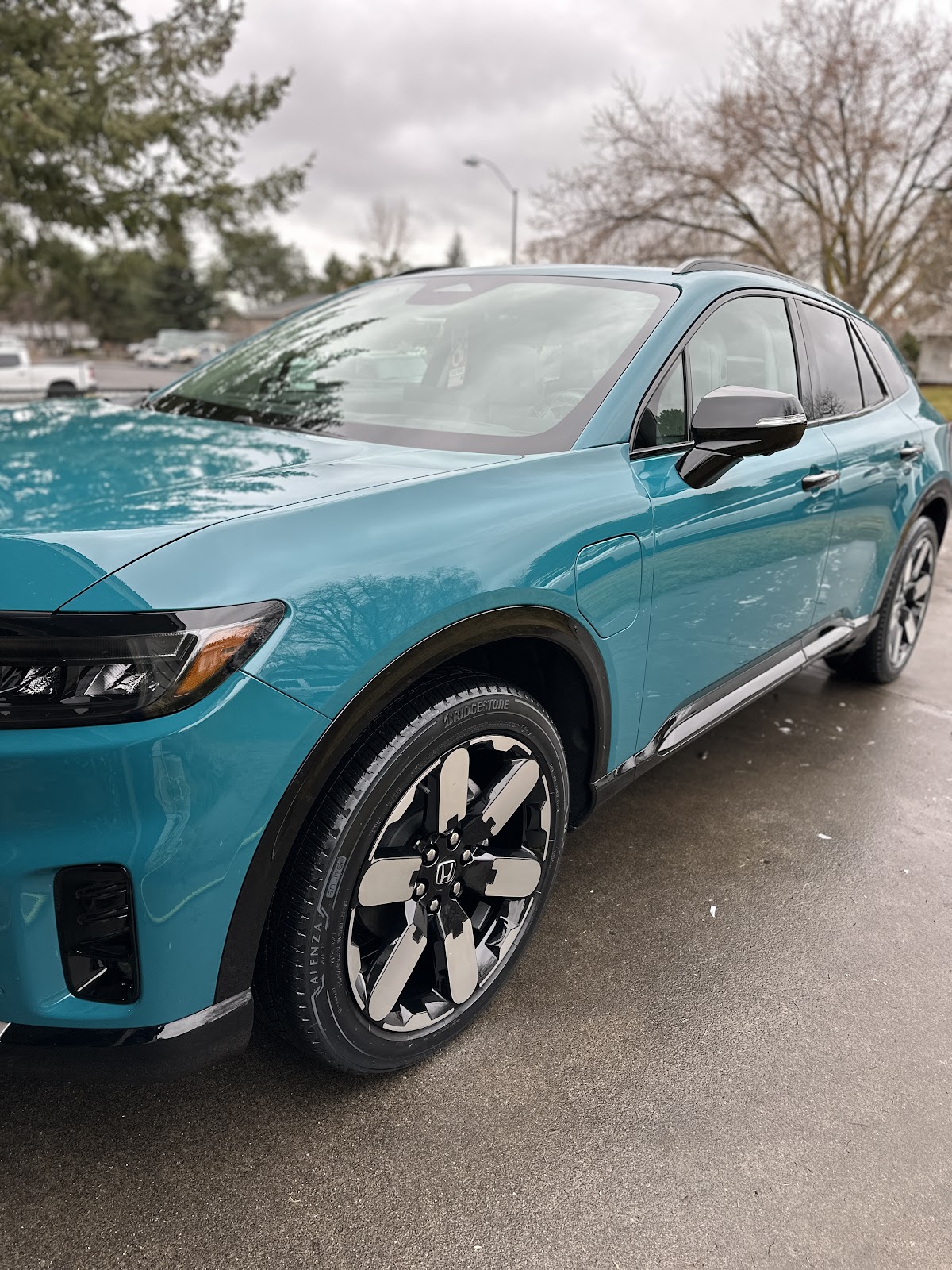 Teal Honda Prologue exterior detailed to a mirror finish