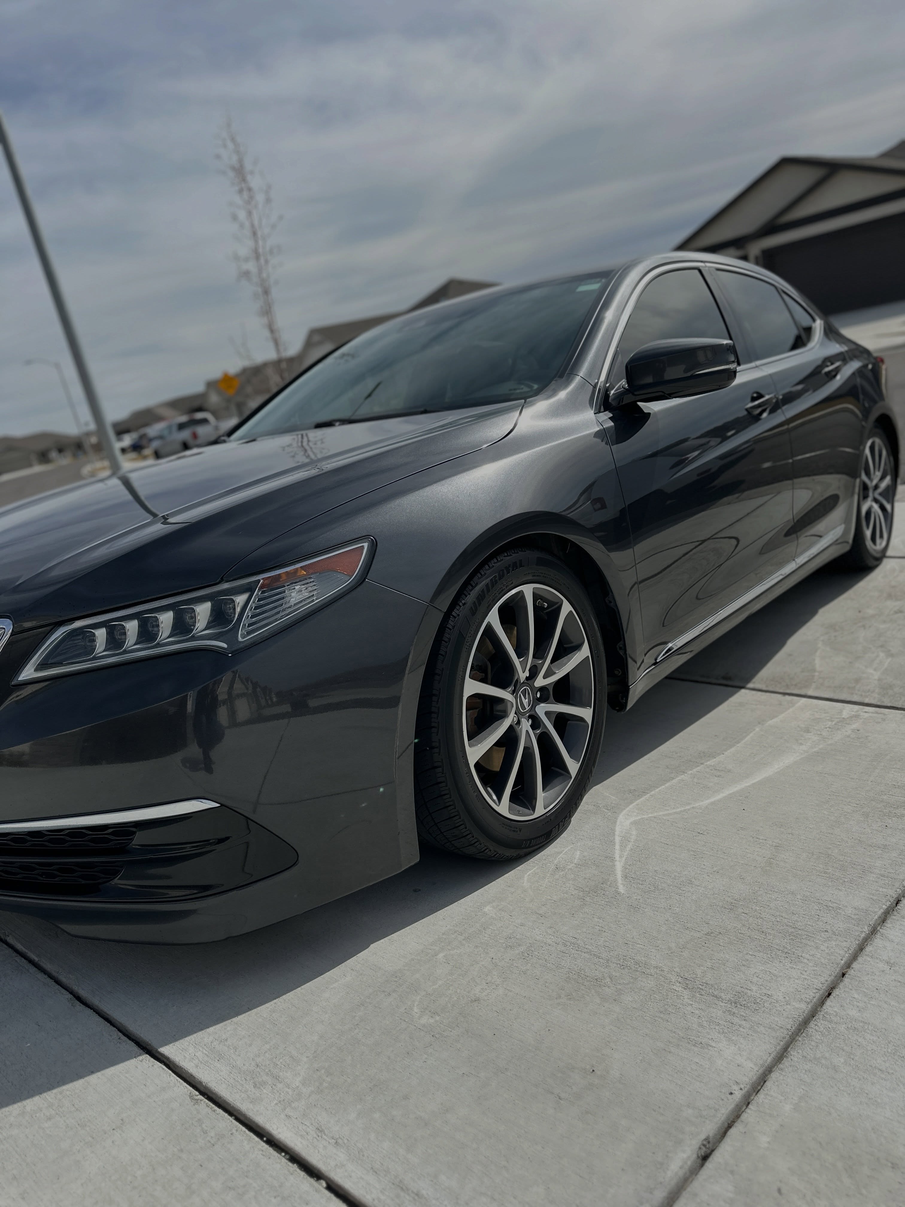 Charcoal Acura TLX with glossy detailed paint